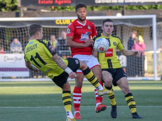 Liam Kitching, right, and Joe Leesley in action against Wrexham. Picture: Matt Kirkham