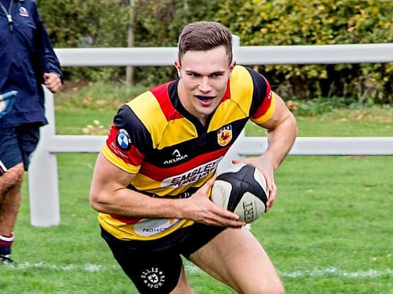 Harry Jukes was injured in the process of scoring Harrogate RUFC's first try against Kendal. Picture: Alistair Hamilton