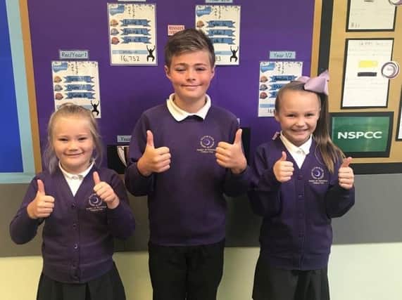 Ripon-based Outwood Primary Academy Greystone school's wtar fundraisers Evie Hattersley, Kieran Hattersley and Lacie Smith.