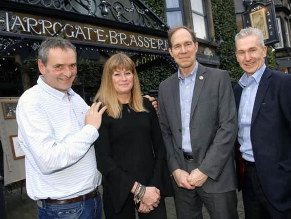 Flashback to early 2017 - Previous Harrogate Brasserie owner Richard Finney and  Amanda Finney handing over to Tim Dewey (chief executive of Timothy Taylor) and John Varley (finance director of Timothy Taylor)(1702204AM3)