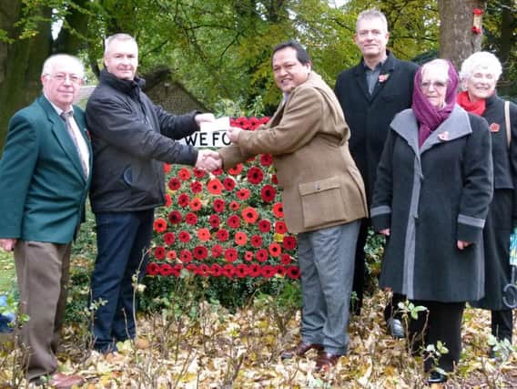 The cheque was handed to Jeet Bahadur Sahi, Chairman of the Royal British Legion (Ripon Branch), at the site of the new Garden of Remembrance by North Stainley Arts Society Chairman, RAF Wing Commander Dr Jonathan Hodgson, and members of the North Stainley Arts Society Committee.