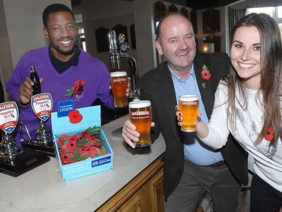 Daleside Brewery's Vincent Staunton visiting the bar at Oakdale Golf Club where Daleside Poppies Ale is being served by club house manager Assan Sowe and deputy club house manager Emily Taylor.  (1810292AM1)