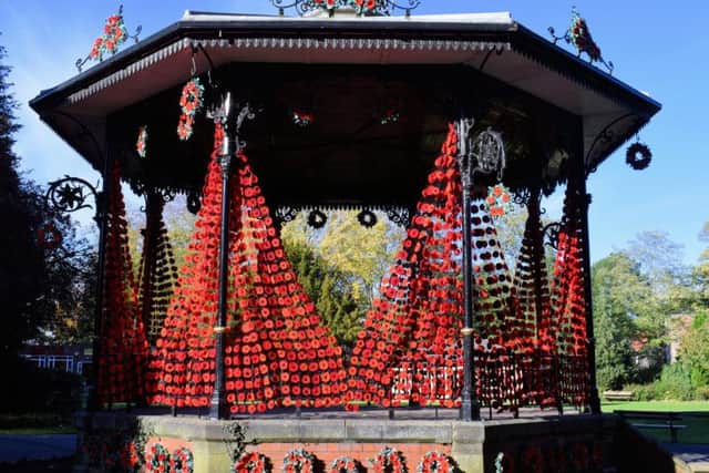 Curtains of poppies draped around Ripon Spa Gardens bandstand. Picture: Rodney Towers.