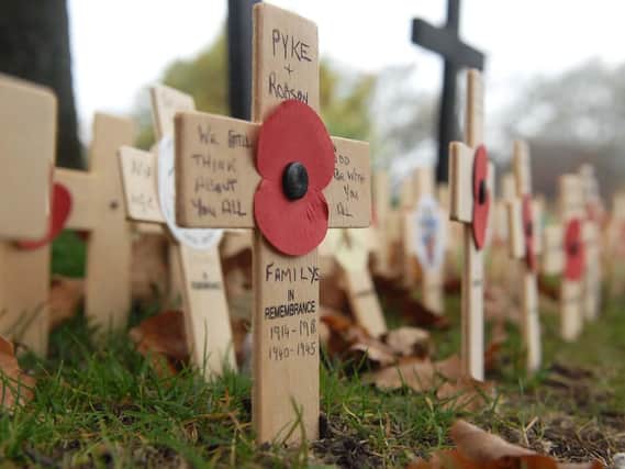 Remembrance crosses and poppies have been left at the Harrogate War Memorial.