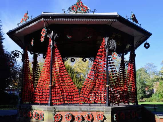 Ripon Spa Gardens bandstand decorated with curtains of poppies. Picture: Rodney Towers.
