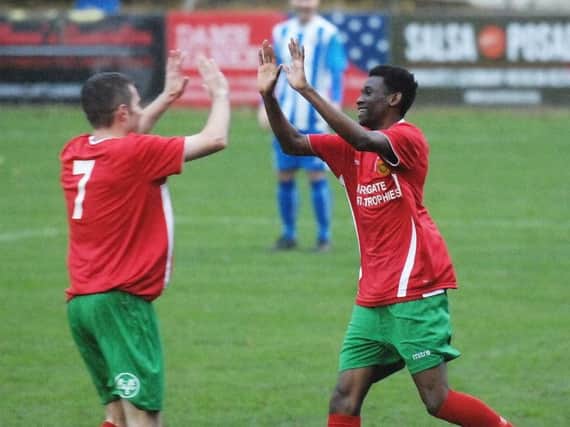 Aaron Kitao, right, is congratulated by Carl Heard after giving Harrogate Railway an early lead against Eccleshill United. Picture: Adrian Murray