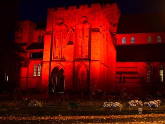 Spectacular and moving tribute to Harrogate's WW1 dead -  St Wilfrids Church on Duchy Road lit up in poppy red.