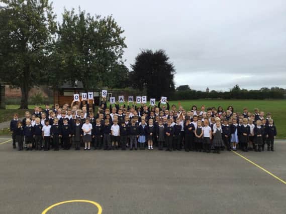 Teachers and pupils at Ripons St Wilfrids Catholic Primary School are celebrating an outstanding report from Ofsted.