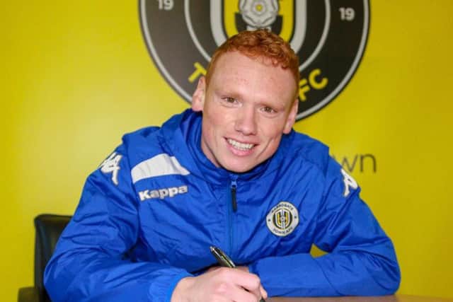 Michael Woods signs up for his second spell at Harrogate Town. Picture: Matt Kirkham