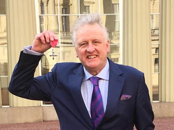Proud moment at Buckingham Palace - Keith Tordoff after receiving his MBE from Prince Charles.
