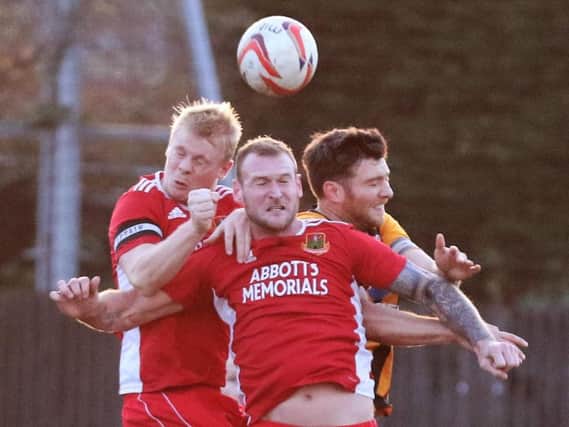 Knaresborough Town duo Will Lenehan, left, and Gregg Anderson challenge for a header at Handsworth. Picture: Craig Dinsdale