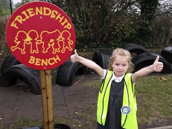 Young Ripon student Amelia Dunn give the thumbs-up to Outwood Primary Academy Greystone's new friendship bench.