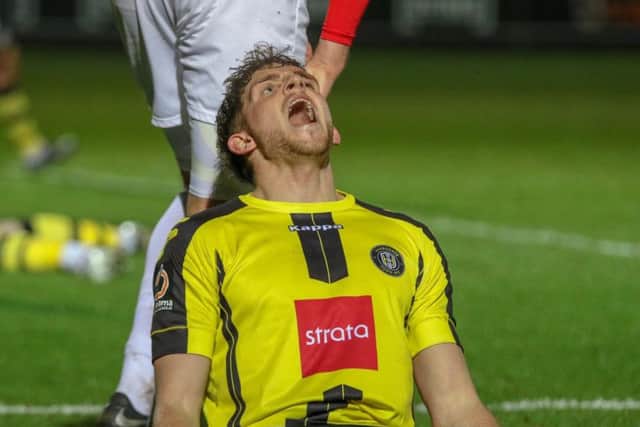 Harrogate Town fell to a painful 3-2 defeat at Salford on Tuesday night.