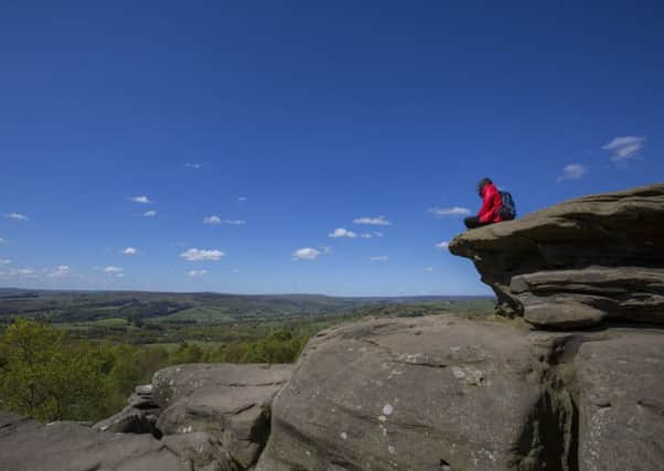 Taking in the view at Brimham Rocks, North Yorkshire. Brimham Rocks is an amazing collection of weird and wonderful rock formations, sculpted over centuries by ice, wind and rain.