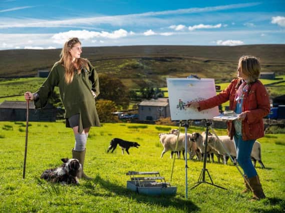 Christmas card collaboration - The Yorkshire Shepherdess Amanda Owen, left, with Harrogate artist Anita Bowerman at Amandas farm Ravenseat in Upper Swaledale. (Picture by Simon Dewhurst)