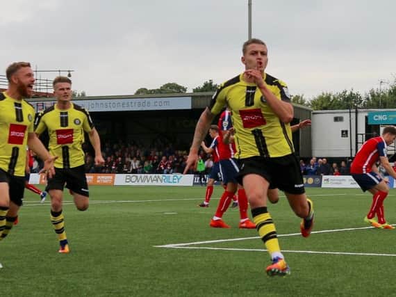 Joe Leesley celebrates in front of the York City fans during last season's derby clash at Wetherby Road. Picture: Matt Kirkham#