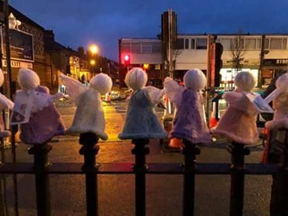Some of the knitted angels along Starbeck high street.