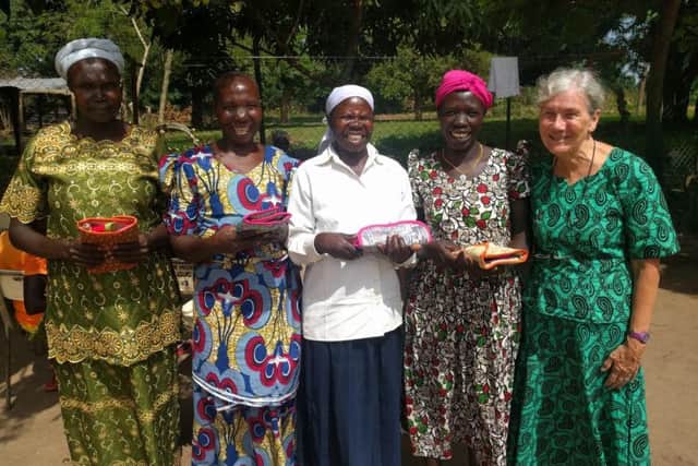 Cathie with some of the pastors wives, holding gifts donated by Holy
Trinity Ripon.
