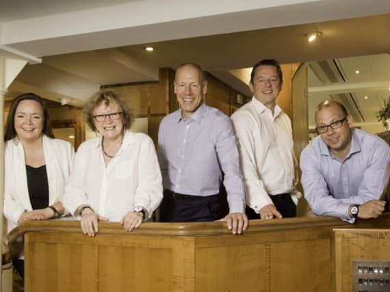 Success - Bettys managing director, Simon Eyles pictured right with other members of the company's  collaborative CEO .