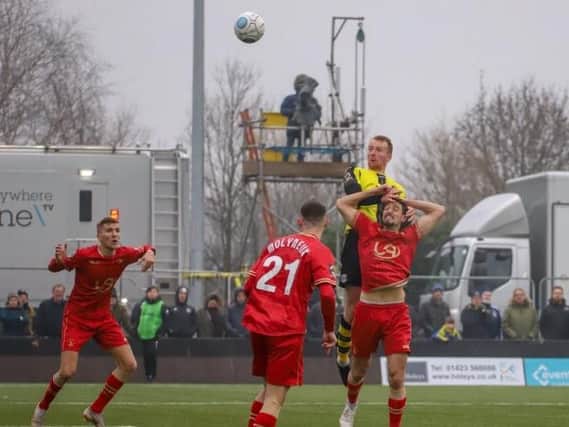 Mark Beck rises to head home Harrogate Town's third goal against Hartlepool United in front of the BT Sport cameras. Picture: Matt Kirkham