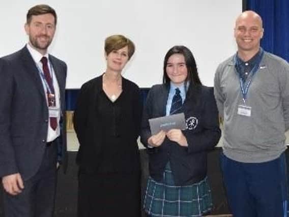 Year 8 student Molly Ryan-Sands won the school's wellbeing logo competition, and was presented with Everyman vouchers for her fantastic efforts.