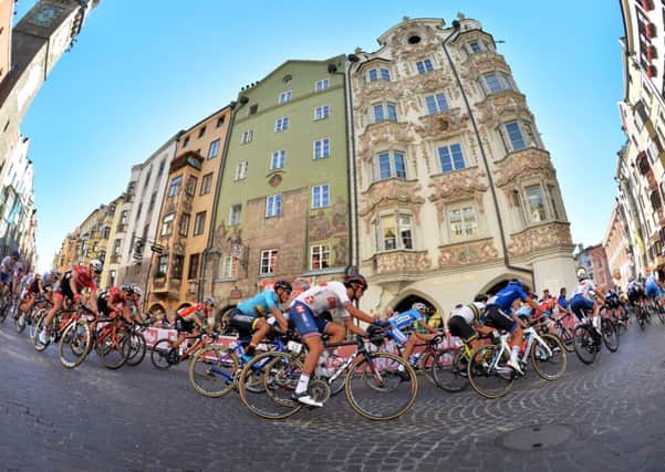 Cyclists race through Innsbruck during the 2018 UCI World Cycling Championships.  PHOTO: Bruce Rollinson