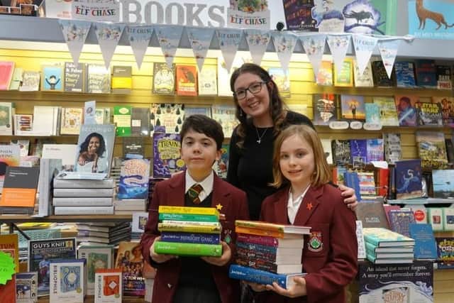 Ashville College pupils Isabella and Elliot with Imagined Things Bookshop owner, Georgia Duffy in her independent shop in Westminster Arcade in Harrogate.