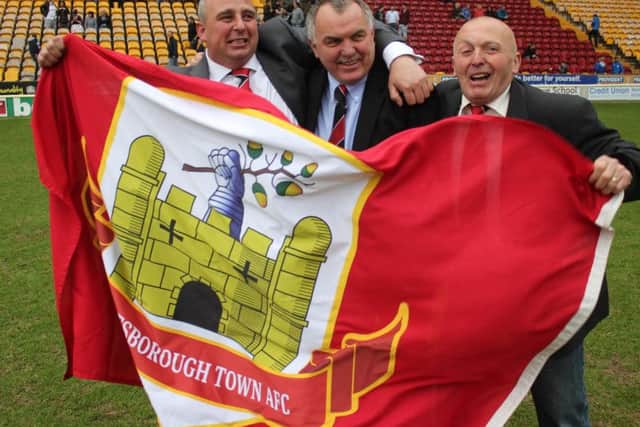 Knaresborough Town's current chairman Peter Plews, left, led the tributes to Terry Hewlett, centre.