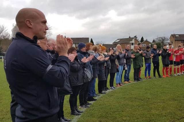 Boro boss Paul Stansfield, left, leads a minute's applause in memory of Terry Hewlett before Saturday's clash with Garforth Town