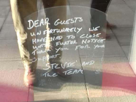 The handwritten sign on the door of the cafe at the Harrogate restaurant/retail complex at the former Beales department store.