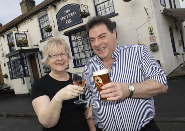 Selling up: Landlord and landlady of The Spotted Ox in Tockwith Ian and Sheila Robinson. Picture : Adrian Murray. (1401272AM1)