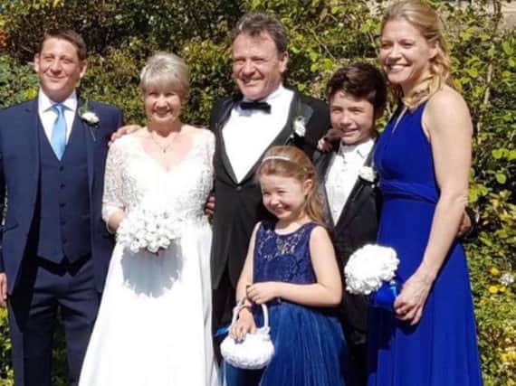 Renewing wedding vows at St Marks Church in Harrogate - Patricia Sutcliffe, second from left, with, from left, her son Adam, who was best man;  her husband John; granddaughter Olivia  who was a flower girl; grandson Lucas, who walked Patricia down the aisle;  and daughter Nikki who was maid of  honour.