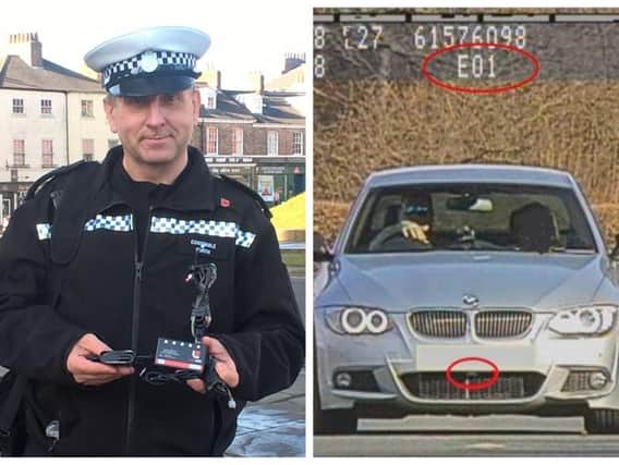 Investigating officer TC Forth and the BMW in question.