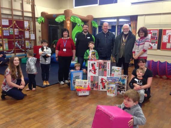 Ripon rotary presents the toys and games to Ohana children's charity.