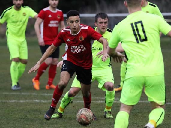 Luke Stewart gets on the ball during Knaresborough Town's home loss to Thackley. Picture: Craig Dinsdale