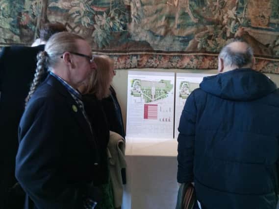 Members of the public at Rudding Park Hotel attending the public consultation over the Crescent Gardens plans.