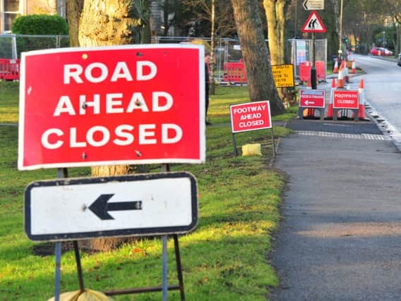 Bad signs for drivers - Roadworks near the Prince of Wales roundabout in Harrogate. (Pictue by Gerard Binks Photography)