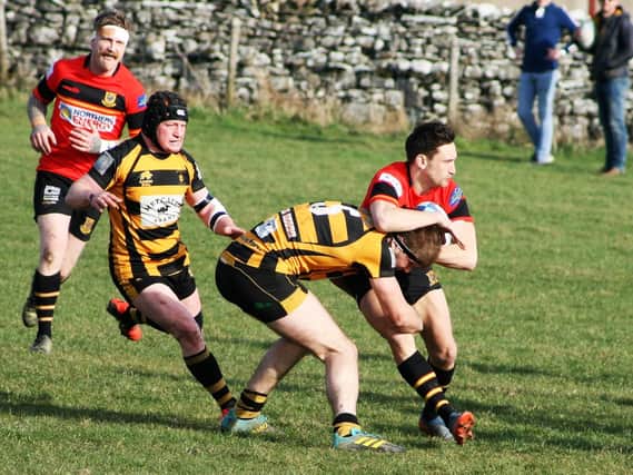 Harrogate Pythons' Ned Rutty is tackled during Saturdays loss to Wensleydale