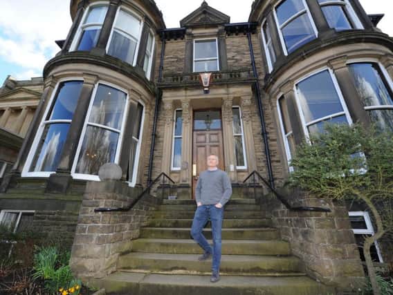 Amazing revival - The Club President Andrew MacMillan outside the historic club in Harrogate. (Picture by Gerard Binks).