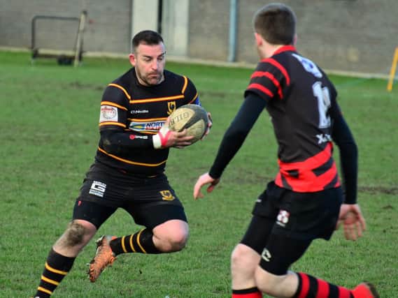 Richard Paterson on the charge during Harrogate Pythons' narrow success over Leeds Modernians.