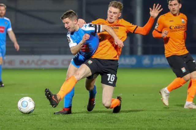 Harrogate Town skipper Josh Falkingham in action against Barnet. Picture: Matt Kirkham