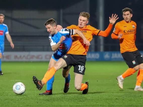 Harrogate Town skipper Josh Falkingham in action against Barnet. Picture: Matt Kirkham