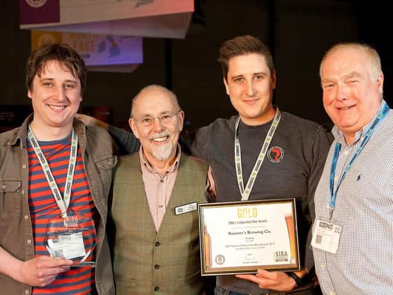 National winners - Harrogate family brewers Oliver, Ian and Tom Fozard, left, celebrate their win at the SIBA National Independent Beer Awards.