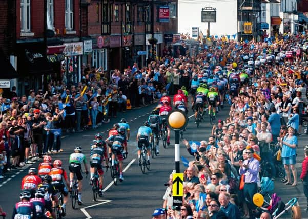 Picture by Alex Whitehead/SWpix.com - 04/05/2018 - Cycling - 2018 Tour de Yorkshire - Stage 2: Barnsley to Ilkley - The peloton travel through Garforth.