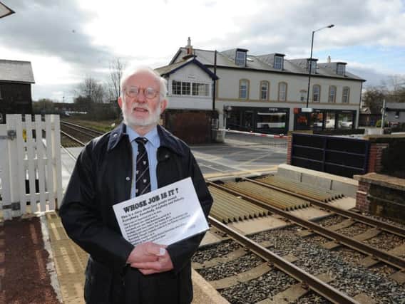 Level crossing 'solutions' - Harrogate resident Trevor Dale, above, is fighting a battle with Network Rail over the amount of time the signals are down at the Starbeck Level Crossing on Knaresborough Road, right. (Picture by Gerard Binks)