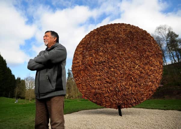 Major Sculpures by Dr Subodh Kerkar are unveiled at the Himalayan Garden and Sculpture Park, Ripon..Dr Subodh is pictured with the sculpture named The Pineapple Disc.28th March 2019.Picture by Simon Hulme