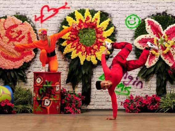 Break dancers Hannah Thompson and Anas Afriad cut some shapes to bring the #kerbcouture street to life. Picture: Gerard Binks.