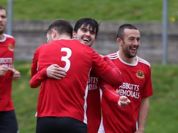 Conor Donoghue is congratulated after scoring the only goal against Liversedge as Knaresborough Town signed off for 2018/19 with a victory. Picture: Craig Dinsdale