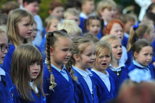 Moorside pupils performing as part of the celebrations. Picture: Gerard Binks.