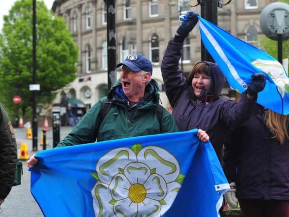 Pride of Yorkshire - Cycling fans at Parliament Street in Harrogate today.